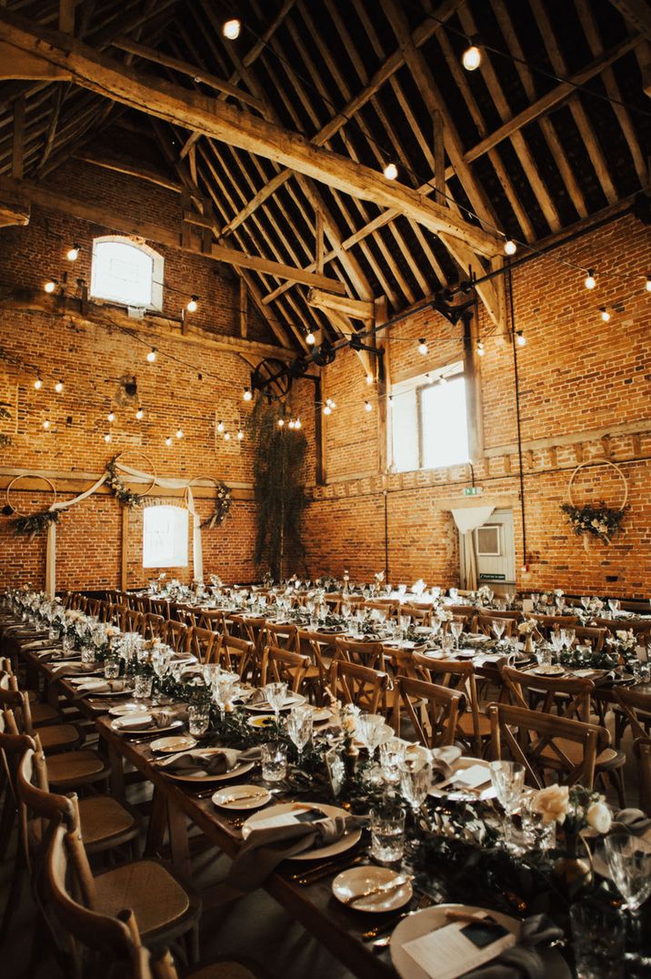 Norfolk wedding venue, Godwick Barn with rustic table decorations 