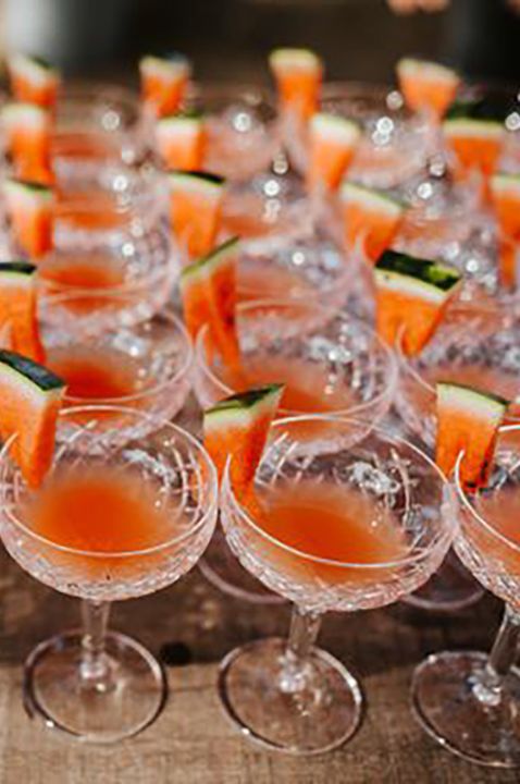 Image of lots of melon flavoured cocktails at a wedding, image by Colin Ross Photography