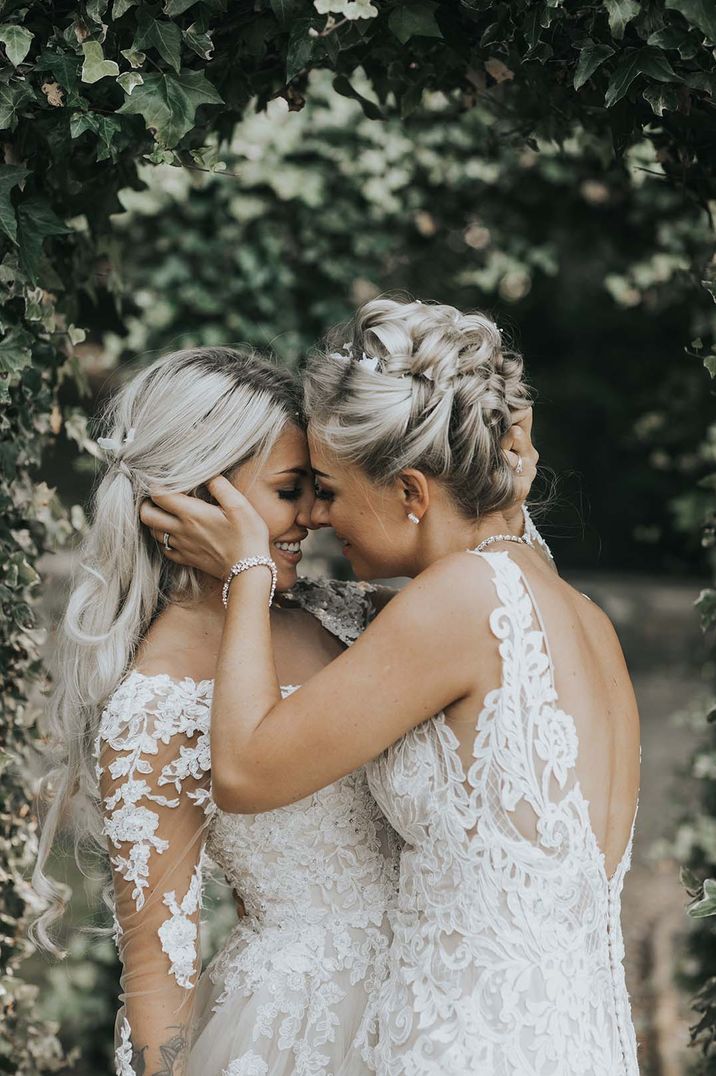 Newlyweds embrace each other for wedding portraits at Crab & Lobster fairytale wedding