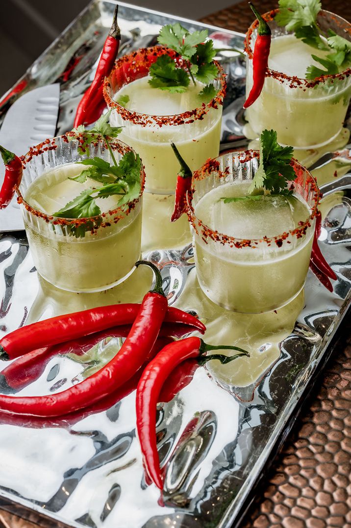 Spicy margarita wedding cocktails with whole chillis and chilli flake rim 