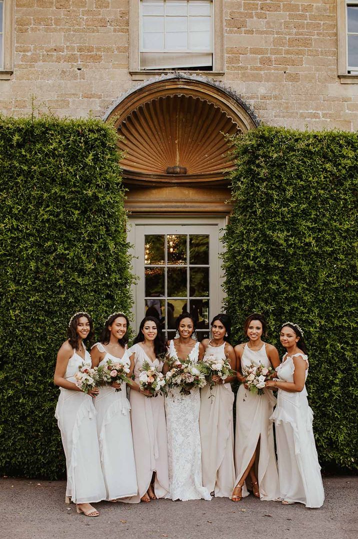 Traditional wedding with white bridesmaids dresses and Pronovias wedding dress