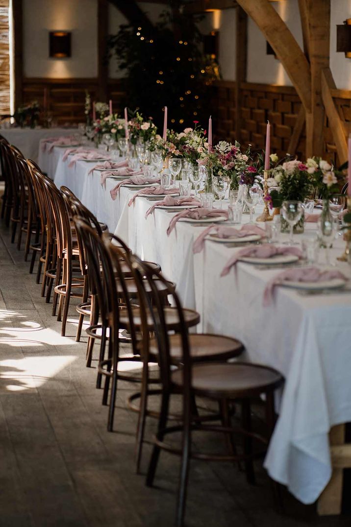 Neutral minimal wedding tablescape with splashes of nude pink 