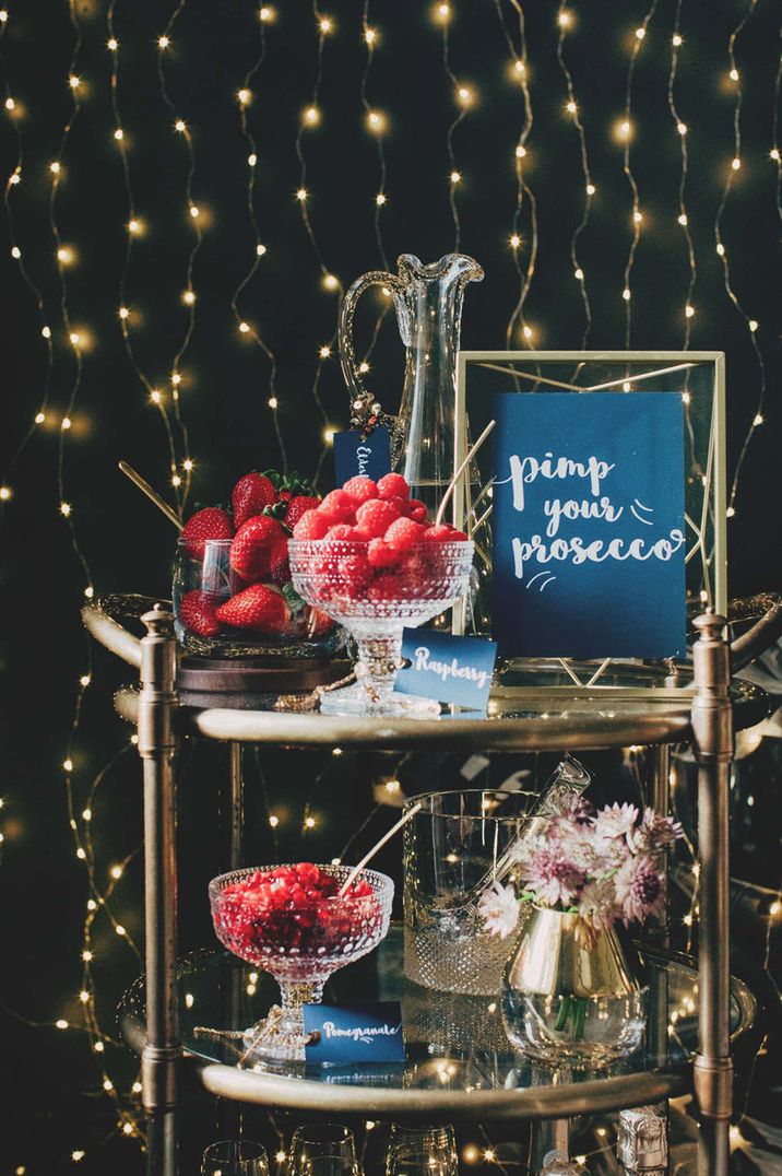 Pimp your Prosecco station with fruit garnishes in bowls with spoons to add to your drink 