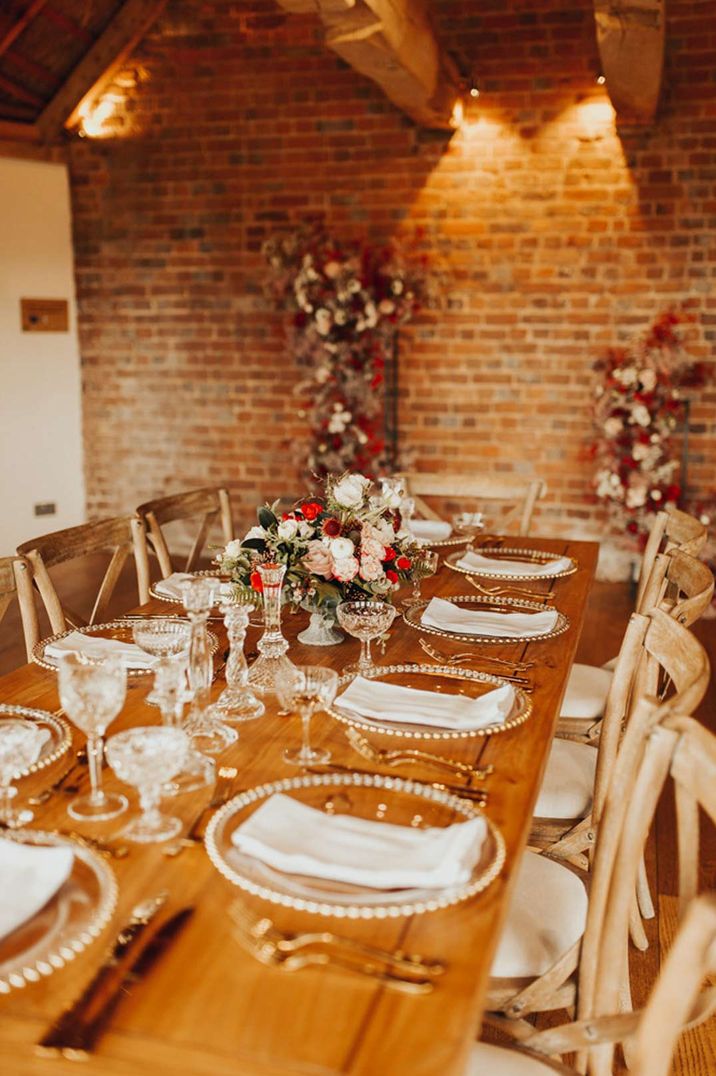 Earthy toned wedding tablescape with glass plates at Brickhouse Vineyard