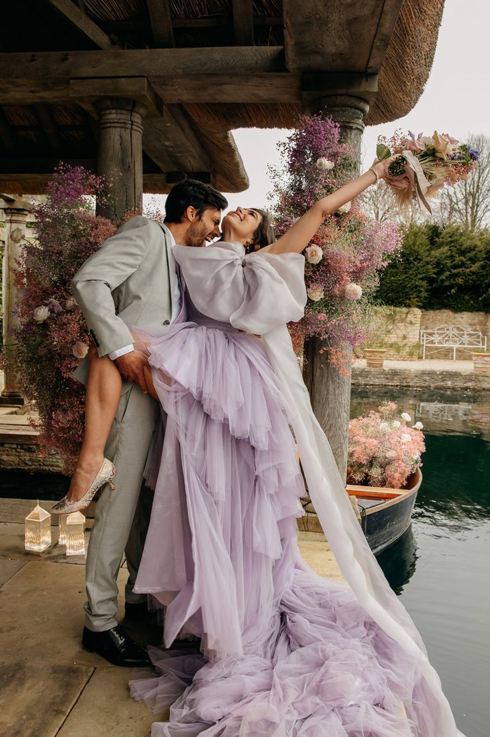 lilac purple coloured wedding dress with layered ruffle tulle design