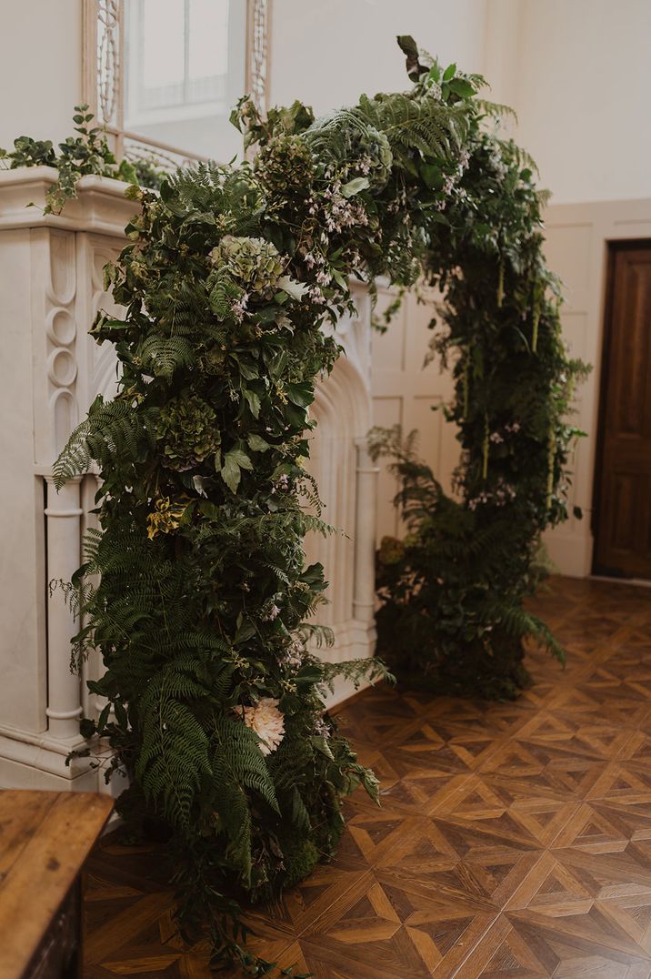 green foliage floral arch at nikah ceremony 