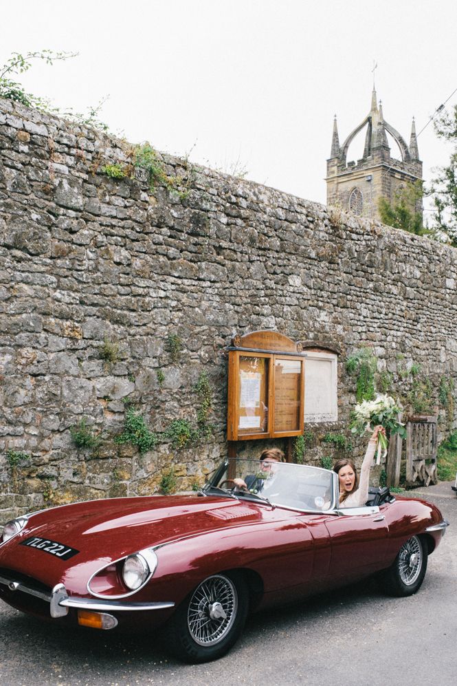 Red convertible vintage wedding car