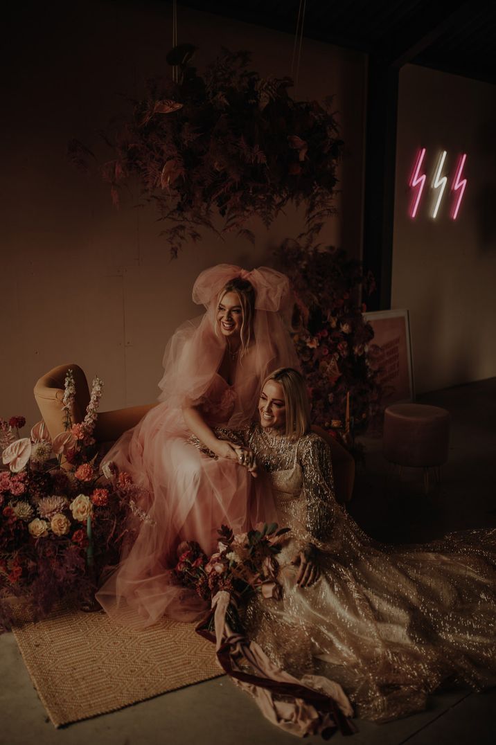 Pink wedding dress and giant bow wedding veil for an alternative inspiration shoot at The Giraffe Shed