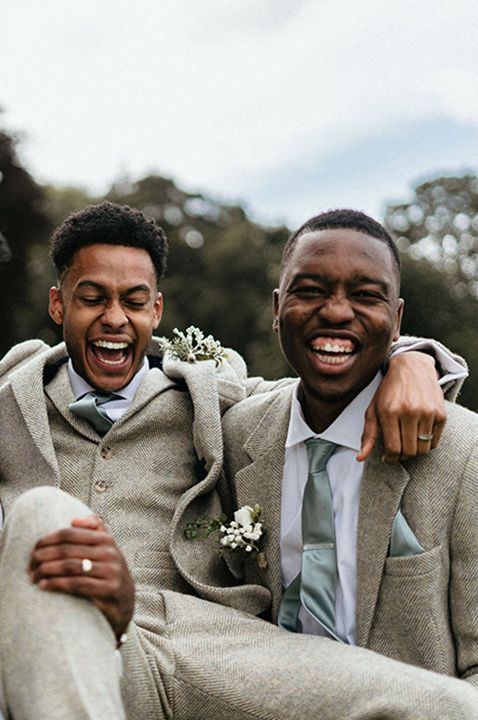 The groom and groomsmen all appear to be having a fun time as they pick up the groom 