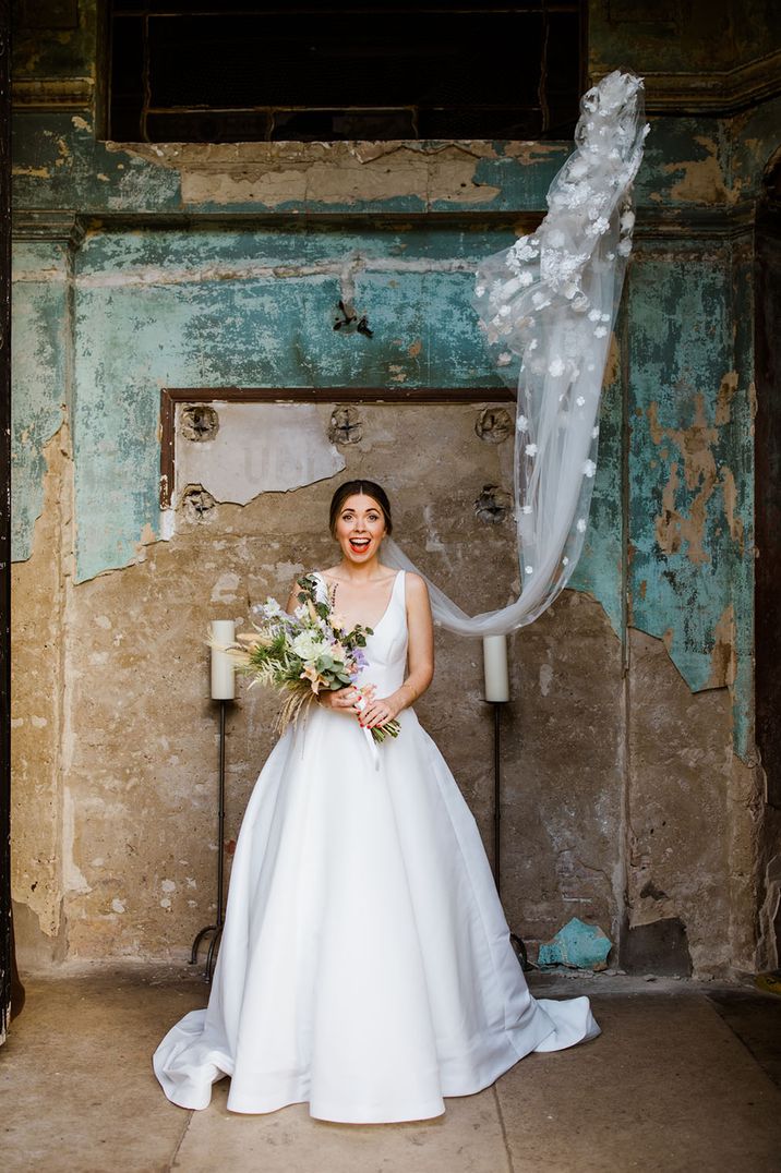 Bride wears veil with 3D flowers at The Asylum 