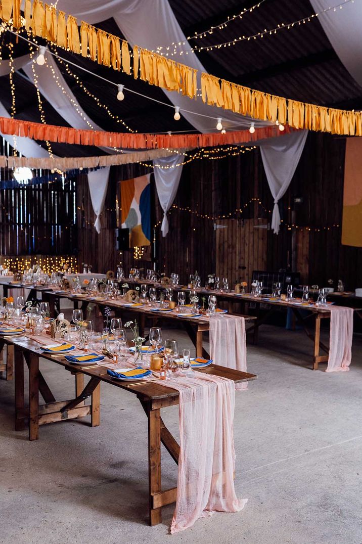 DIY farm wedding with streamers, bunting and pink table runners 