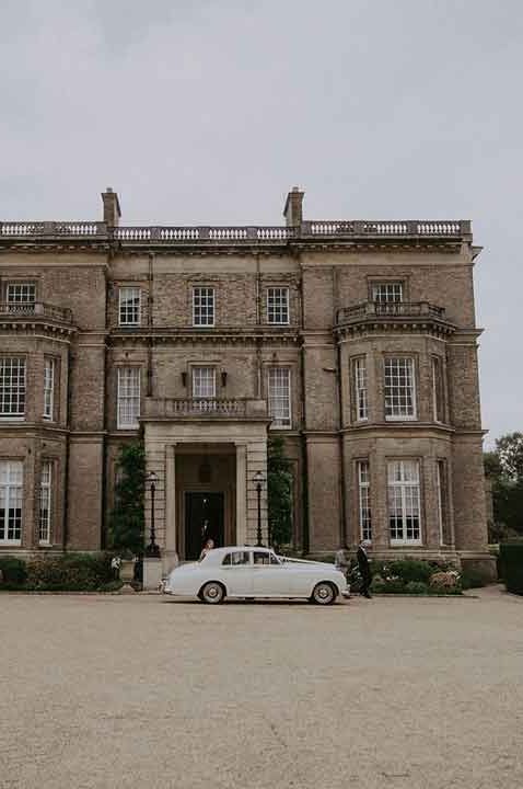 The exterior of Hedsor House classic UK wedding venue - wedding venue search 