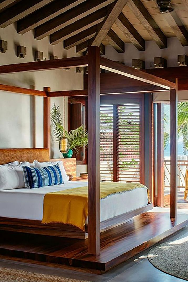 Image of Airbnb honeymoon accommodation with four poster bed frame 