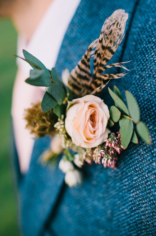 Peach spray rose and pheasant feather buttonhole