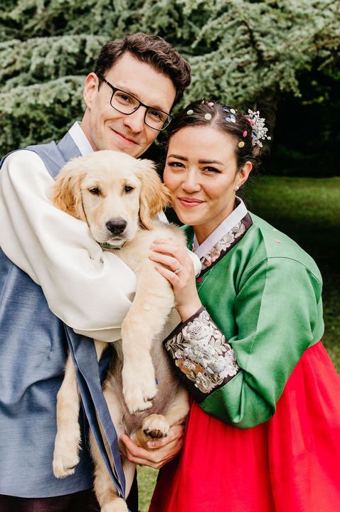 Bride and groom in traditional Horan Korean wedding outfits at their intimate wedding 