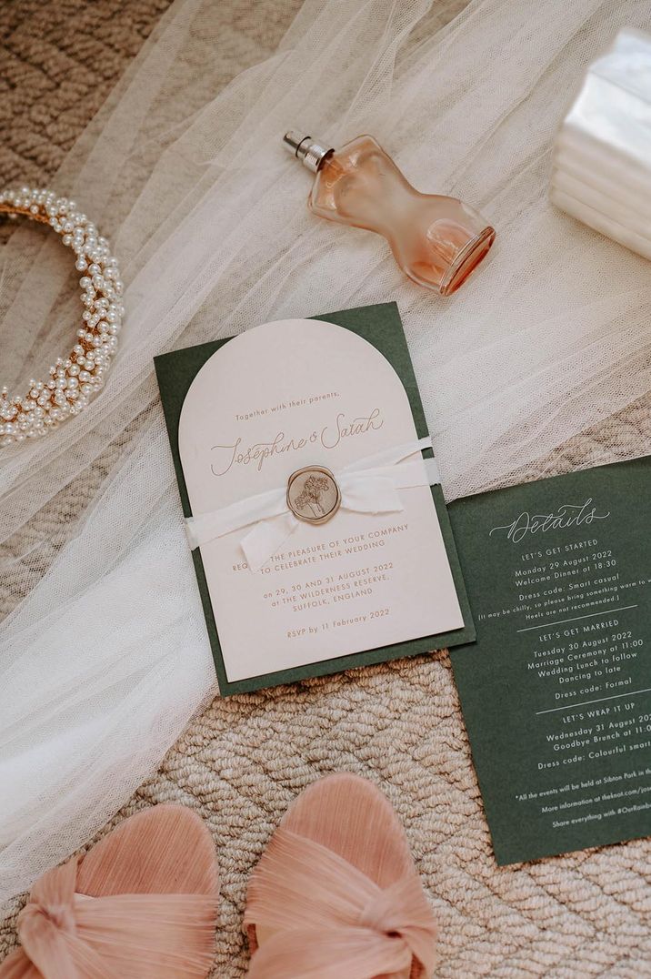 Green, white, and gold wedding stationery with wax seal with the bride's perfume, Loeffler Randall shoes and pearl headband 