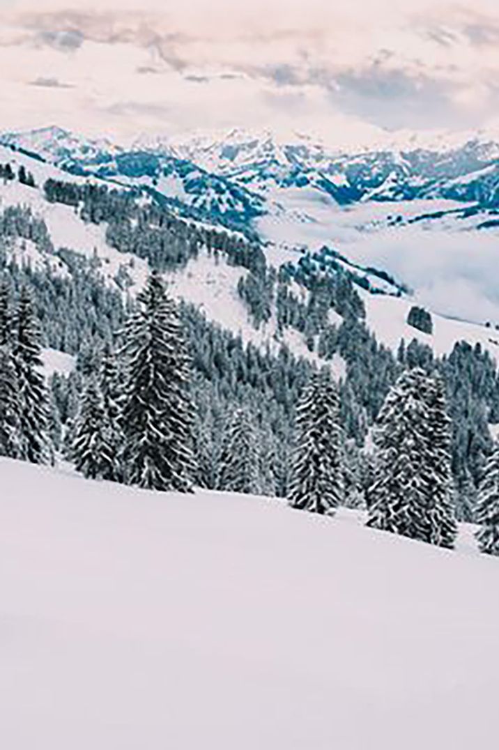 Snowy swiss mountain landscape for wedding in Switzerland by Modern Vintage Weddings Photography