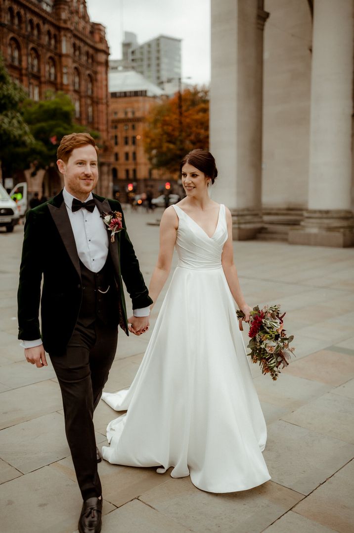 Traditional taffeta plunge neck princess wedding dress by Paul & Nanda Photography