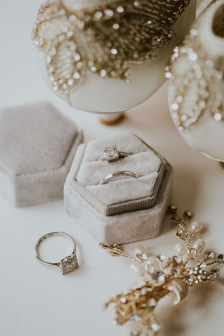 diamond engagement ring and wedding band in a grey velvet hexagonal ring box