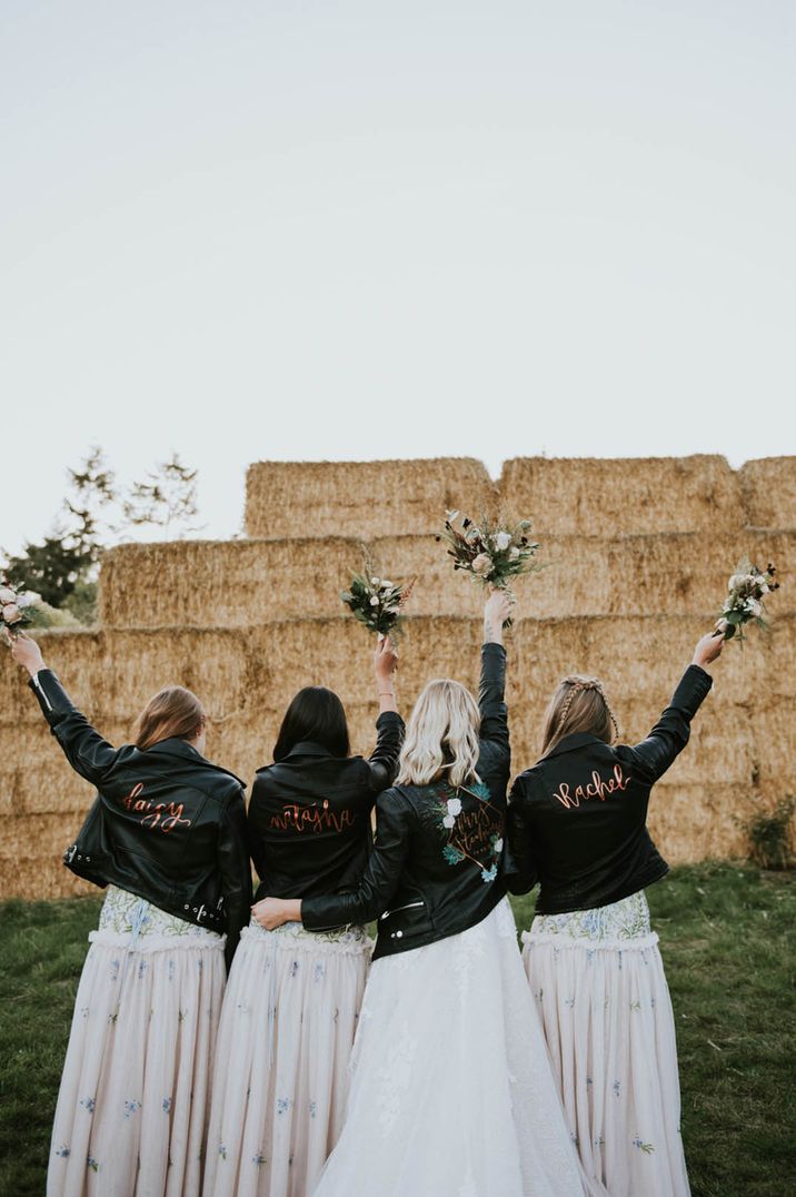 Bridesmaid leather jackets personalised with their name on in rose gold font 