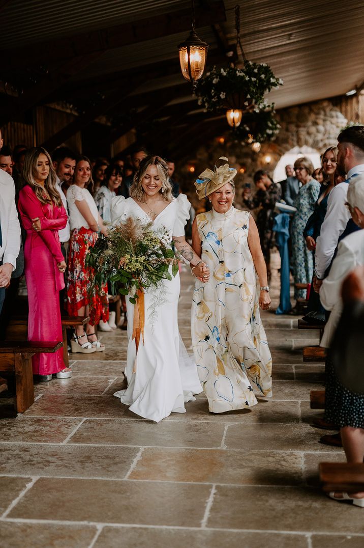 Mother of the bride walks the bride down the aisle at Loughborough wedding venue 