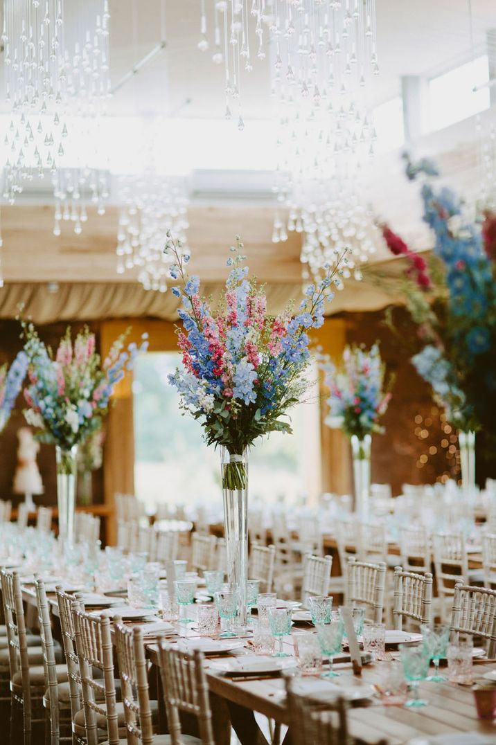 Blue and pink Larkspur wedding table decorations inspired by July birth flowers 