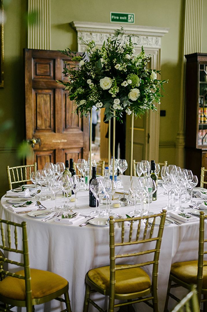 Dog friendly wedding venue, Howsham Hall with traditional white and green wedding table decorations 