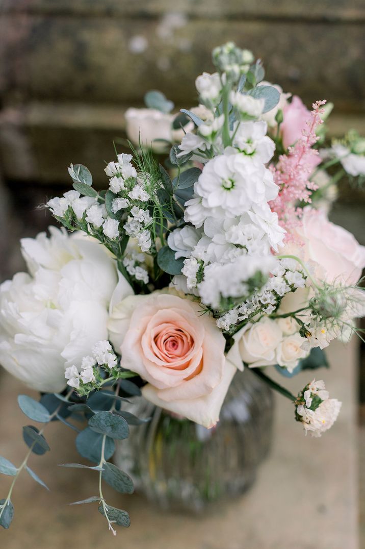 Pale pink and white flowers for summer wedding flower arrangement