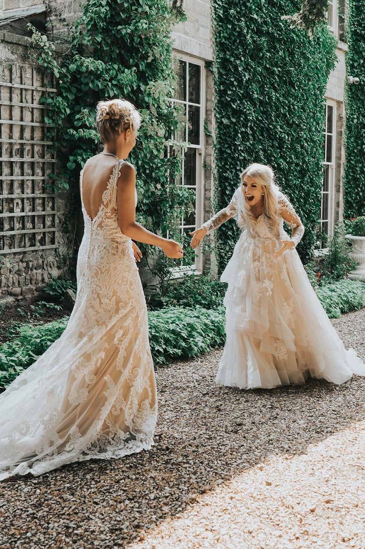 Couple engage in a 'first look' before their wedding ceremony, laughing with mouths open