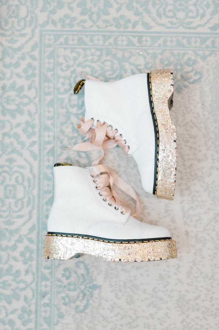 Alternative white platform glittery wedding Dr Martens with pink ribbon laces