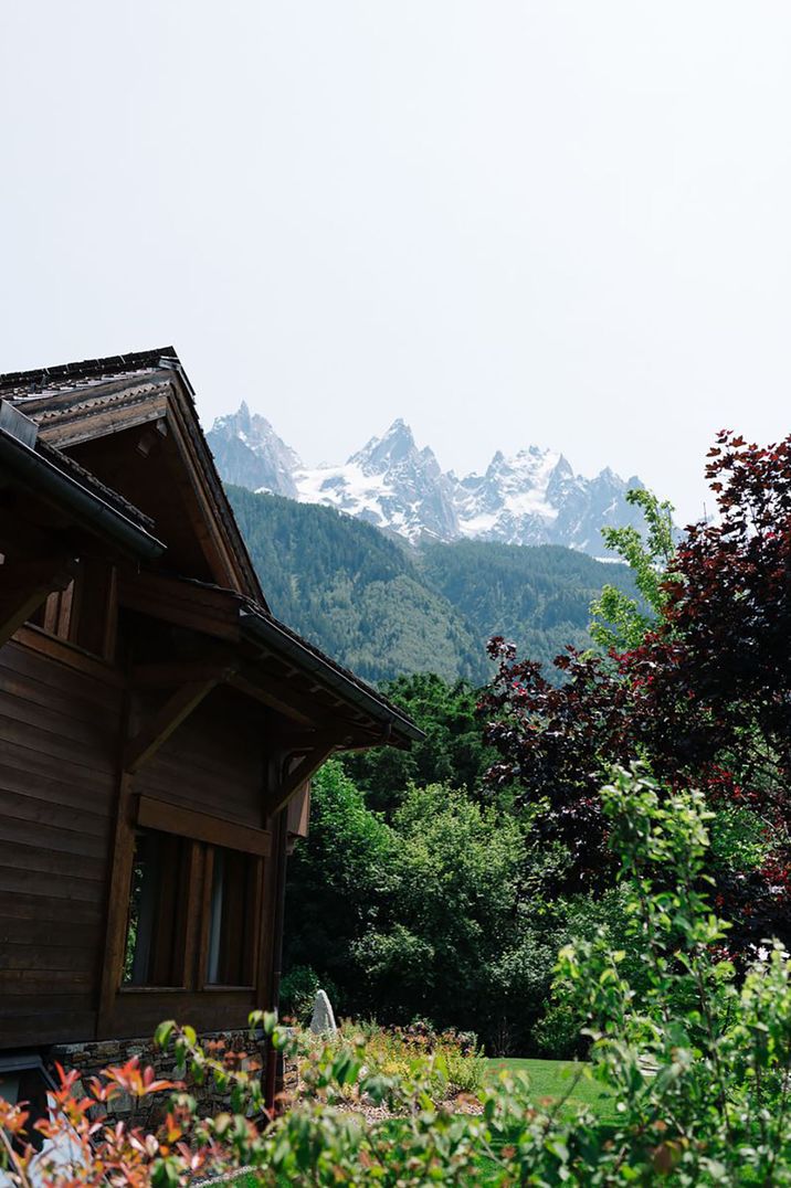 Log cabin and mountain landscape in Switzerland by Modern Vintage Weddings Photography