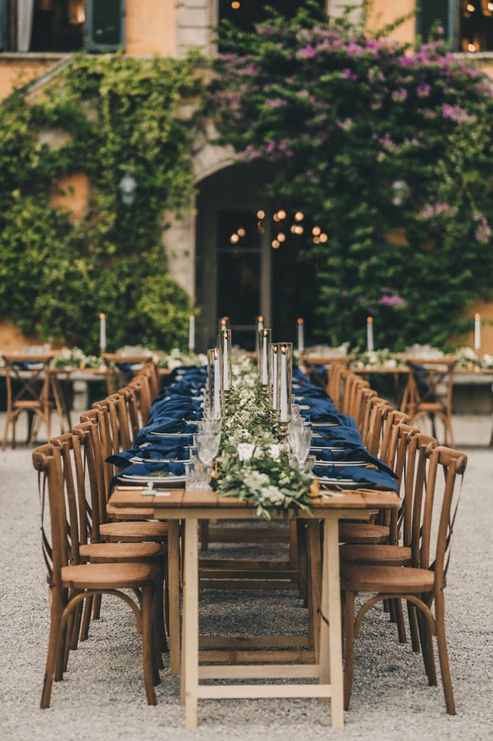 Wedding table set up outdoors for wedding in Tuscany, Italy by Claire Penn Photography