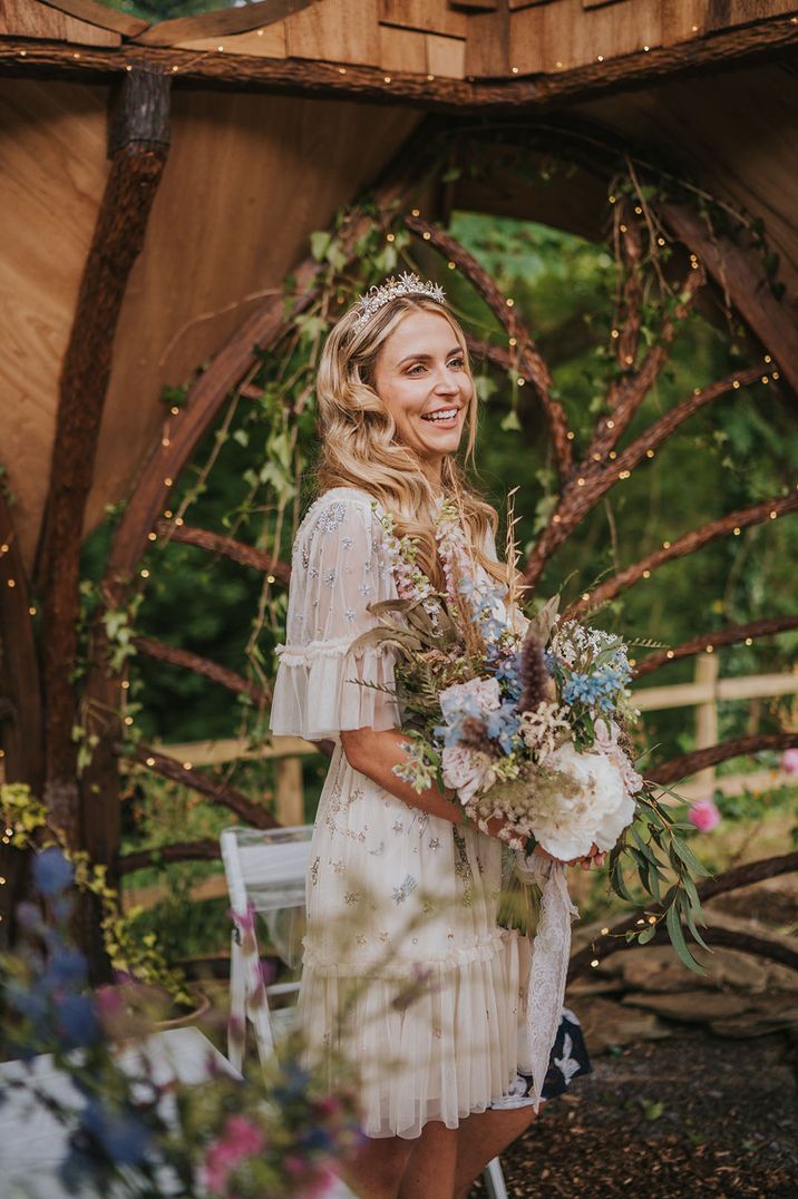 Short ruffle lace and embroidered wedding dress for an outdoor woodland ceremony 