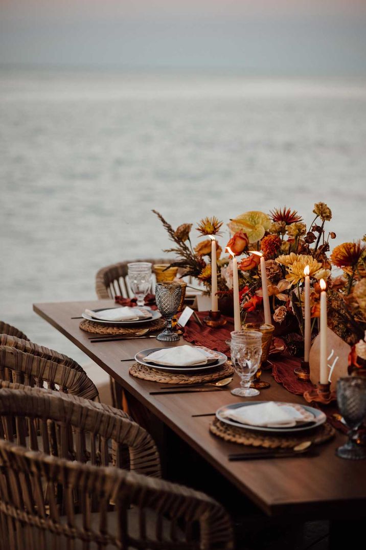 Autumnal rustic beach wedding tablescape at destination wedding 