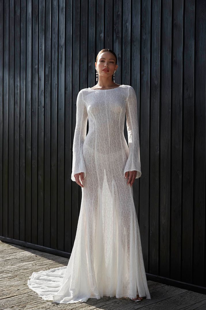 Textured muslin sheer wedding dress with long sleeves for the modern bride 