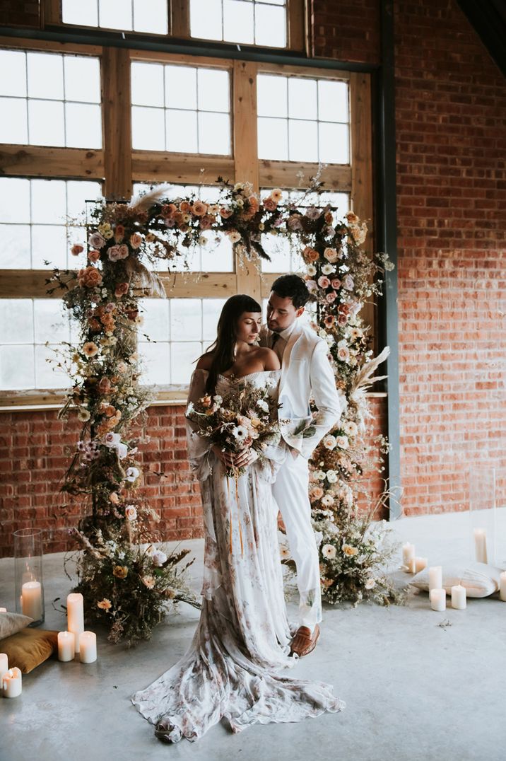 Bride and groom posing for their photos at one of the most popular wedding venues of 2023 