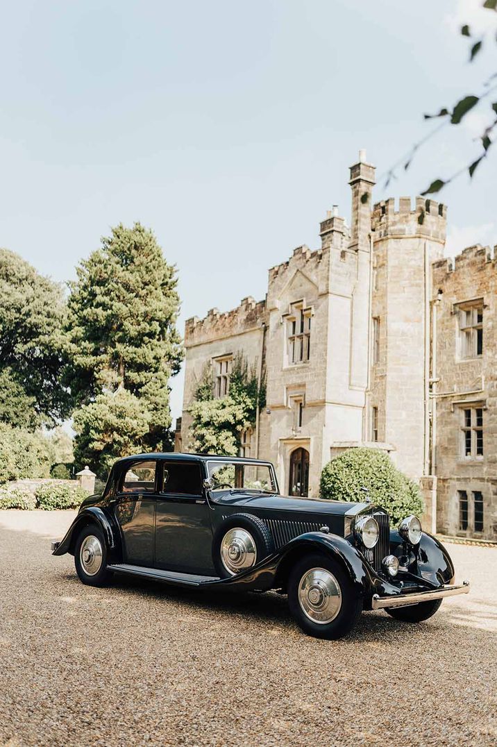 Classic black Rolls Royce wedding car 