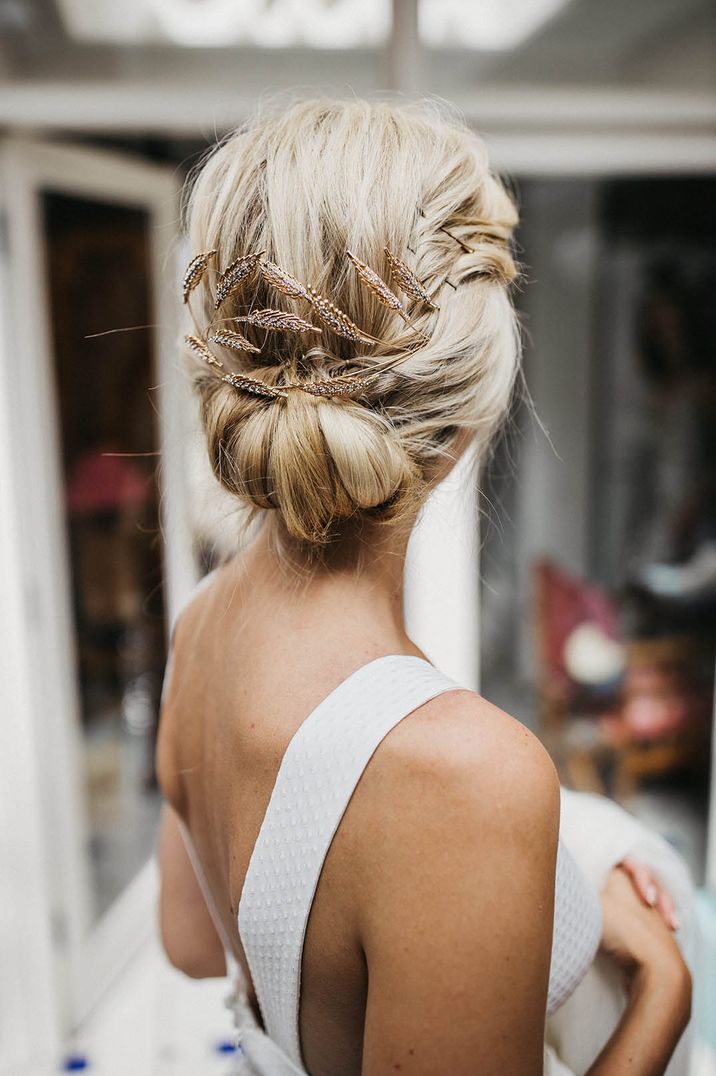 wedding hairstyle with delicate hair accessories 