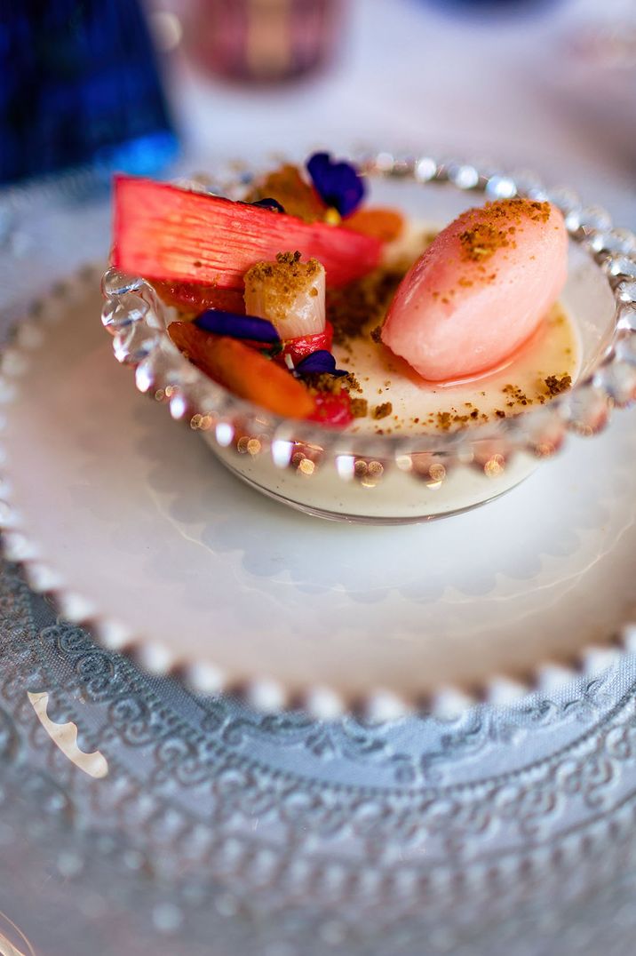 Vanilla buttermilk panna cotta, rhubarb, ginger, blood orange sorbet wedding dessert at traditional plated formal dining experience 