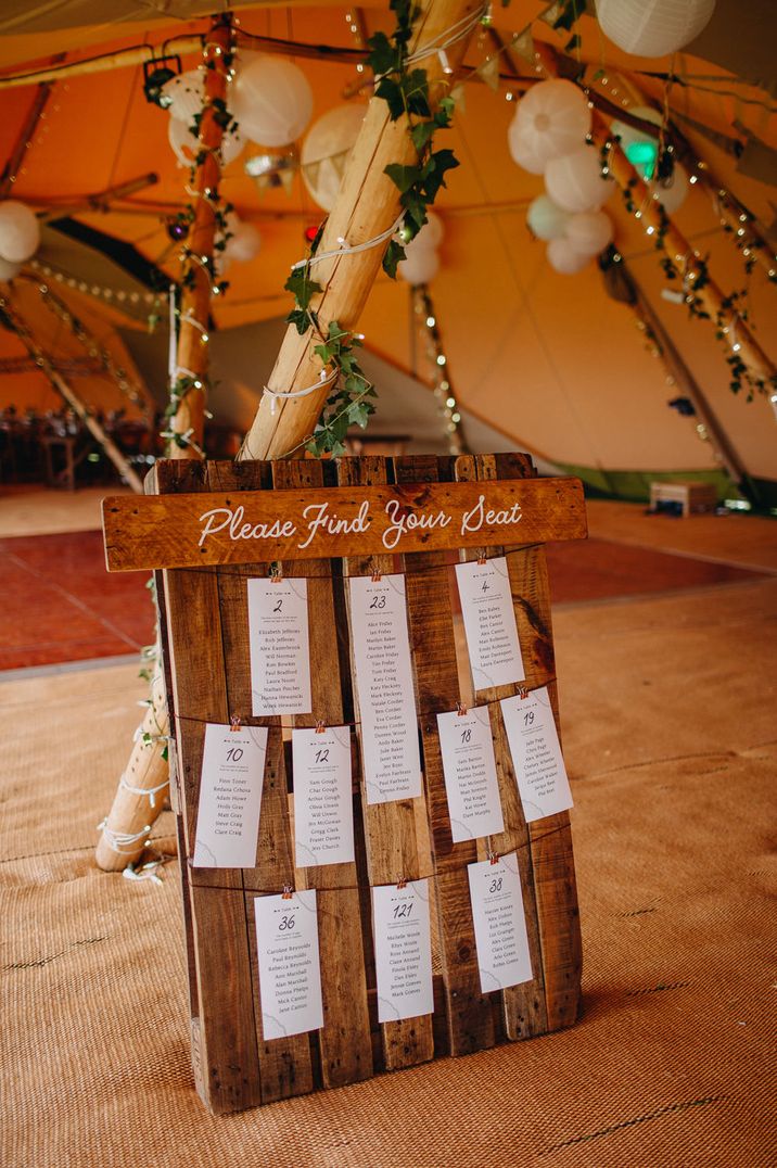 Wooden palette Seating Chart for rustic tipi wedding