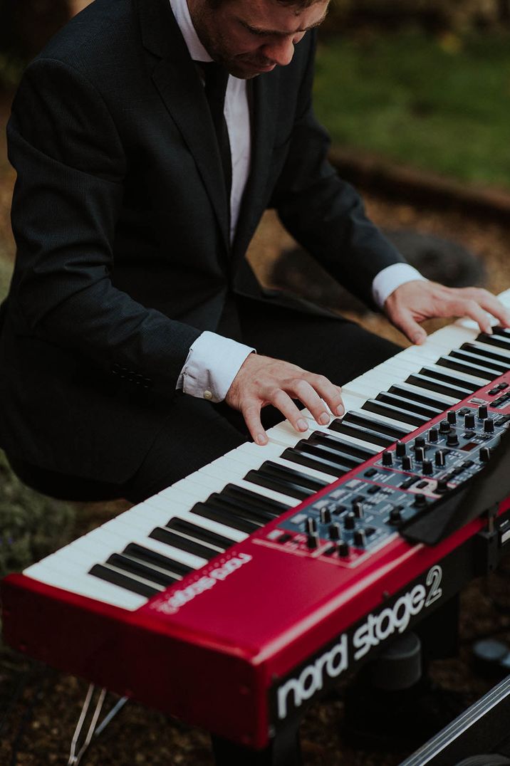 Keyboard player at wedding celebration 