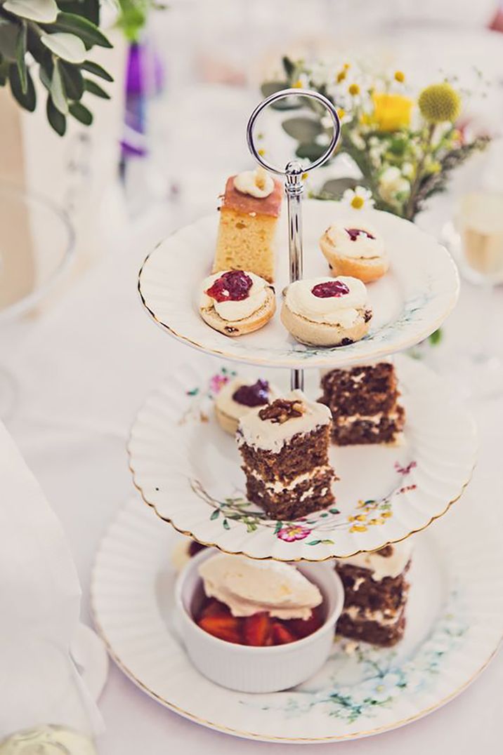 Afternoon tea stand with cakes and sweet treats by Claire Penn Photography