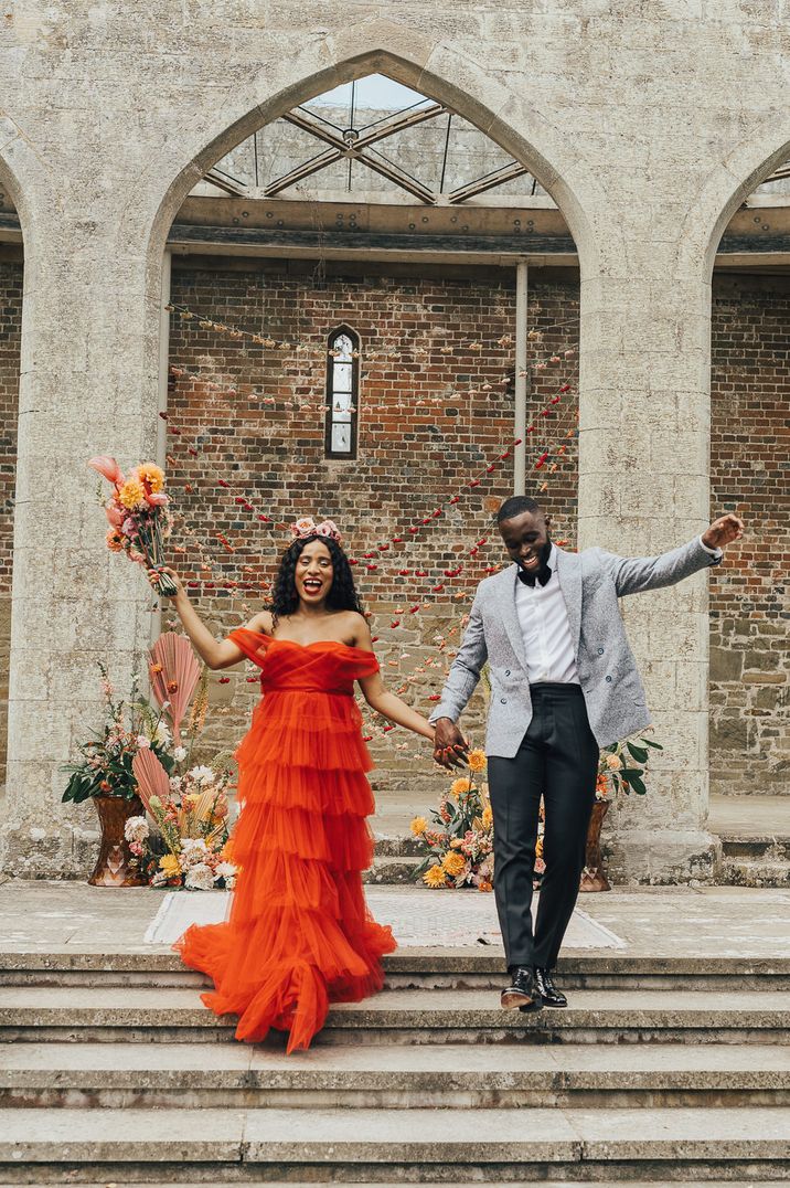 red coloured ruffle wedding dress in maxi length