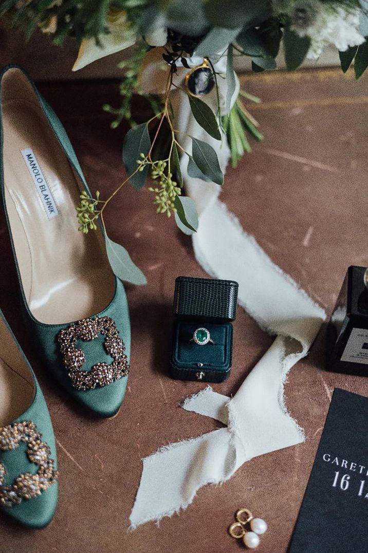 Green Manolo Blahnik wedding shoes with emerald stone engagement ring 