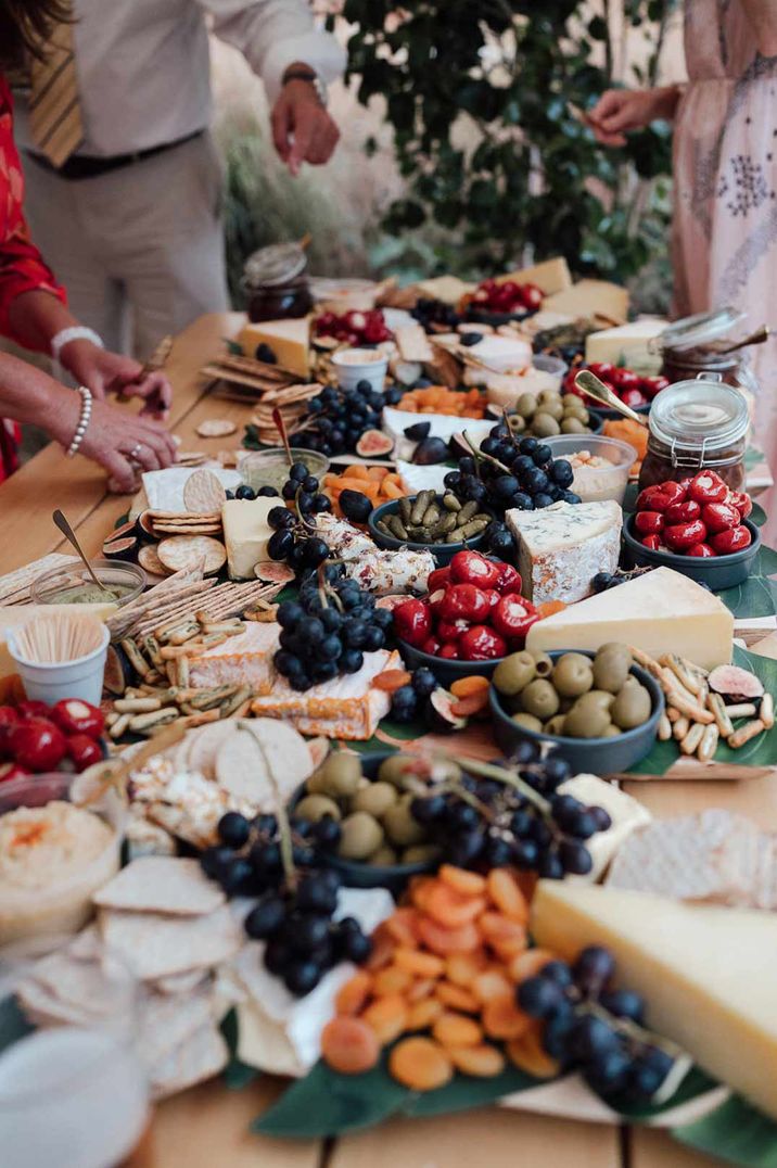 European style wedding grazing table with crudités, cheese, crackers and other snacks at Pythouse Kitchen Garden