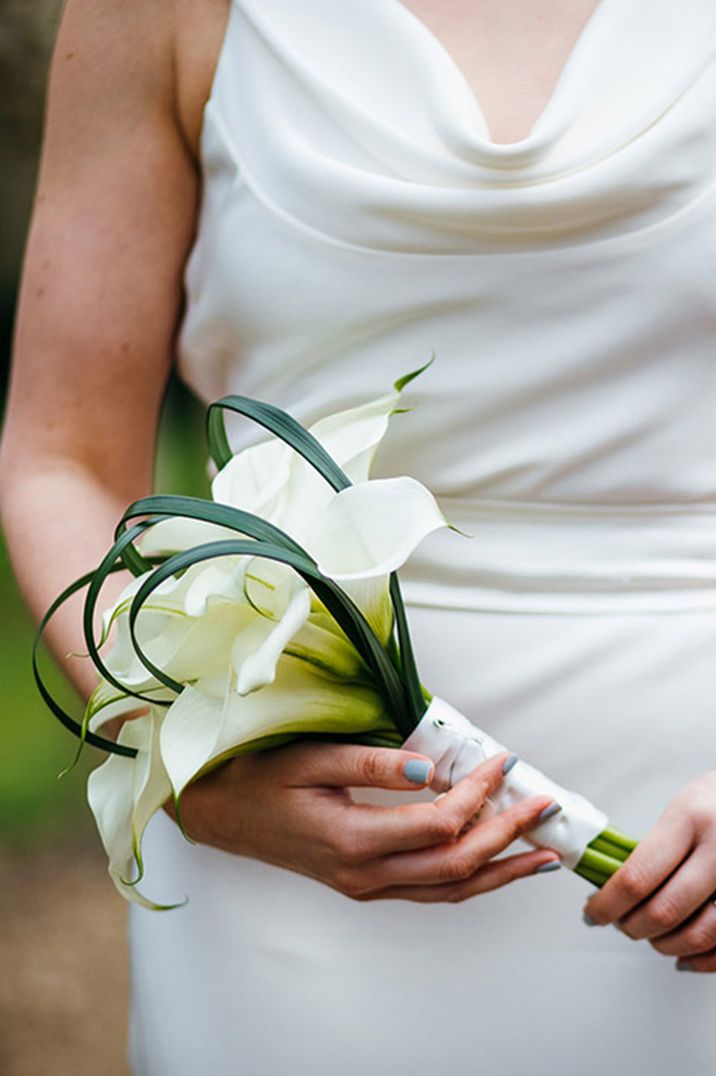 White lily wedding bouquet inspired by May birth flowers 