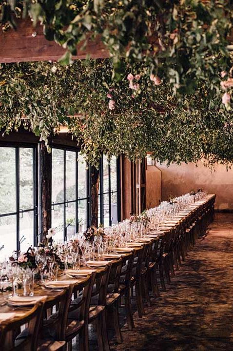 Neutral, earthy themed wedding tablescape at Dewsall Court, unusual wedding venues