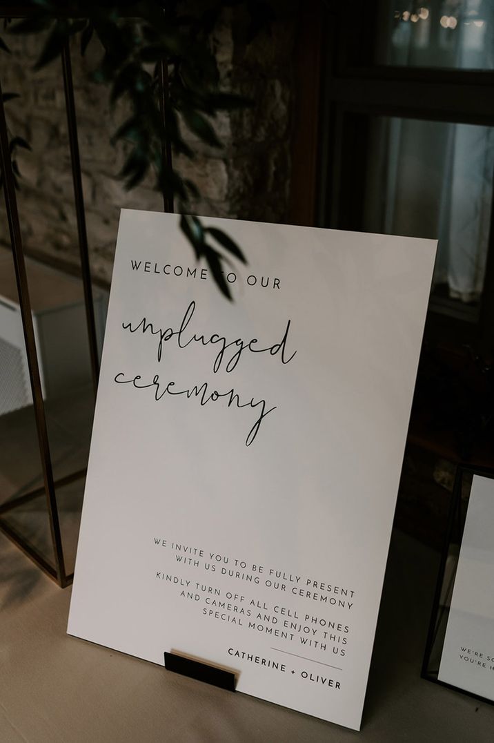 Minimal black and white unplugged wedding ceremony sign