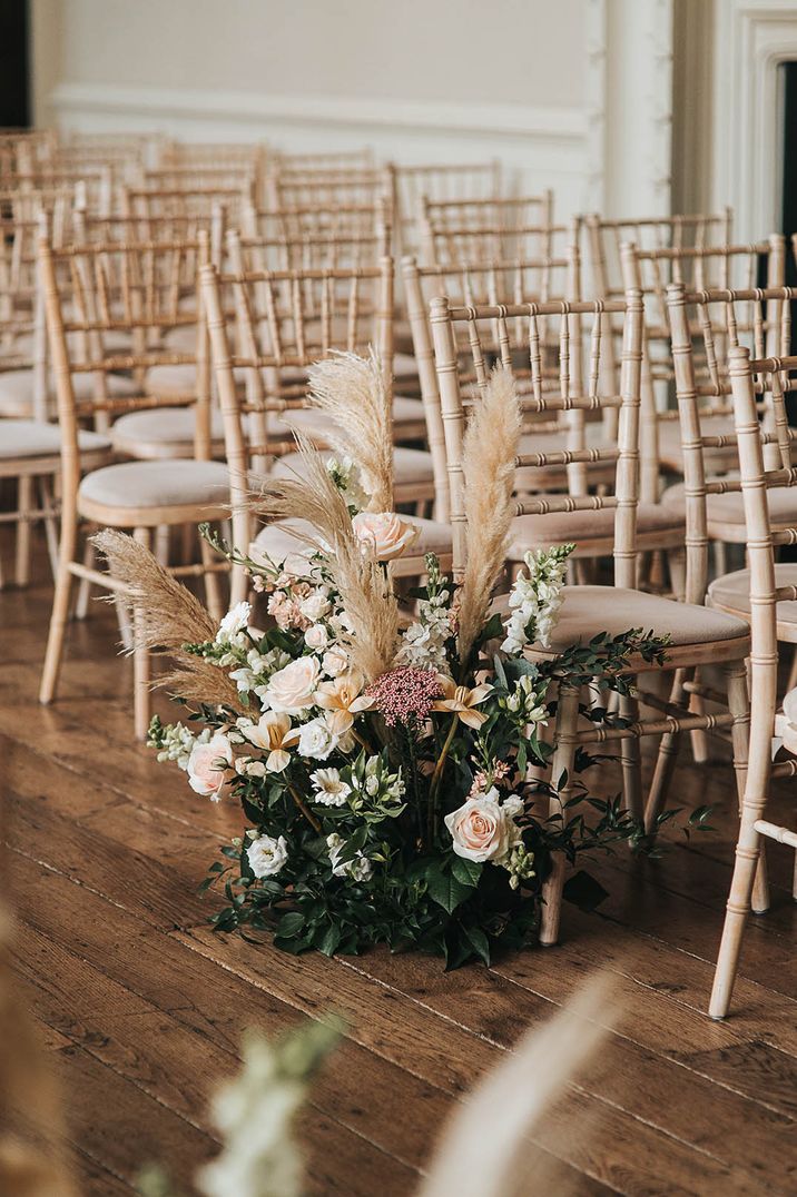 Pampas grass wedding aisle decoration at Elmore Court with pink roses 