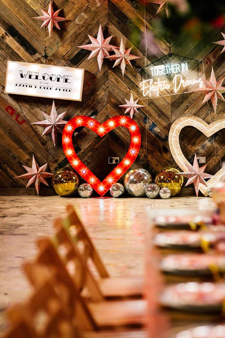 Large heart shaped neon wedding signs at The Canary Shed - one of the most Instagrammable wedding venues